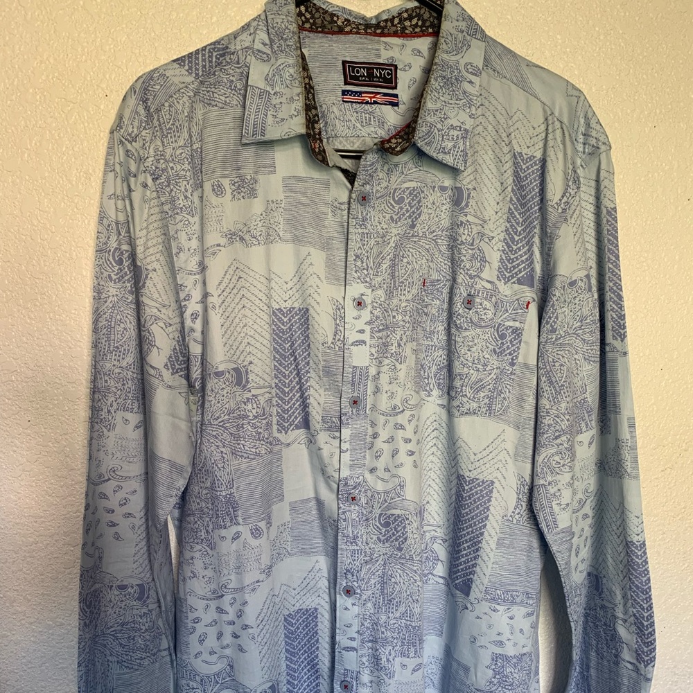 It’s light blue color, LON NYC brand,USA XL shirt.